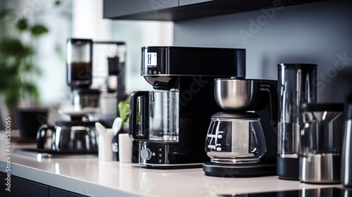 A variety of modern kitchen appliances in a sleek contemporary kitchen.