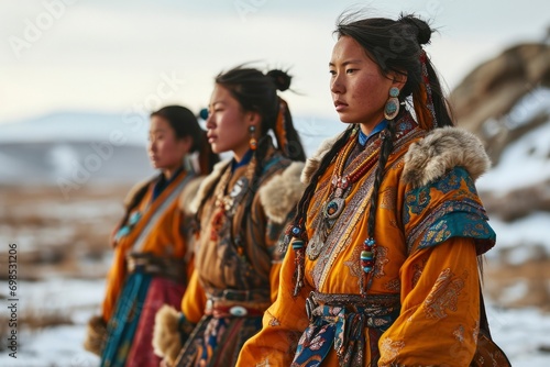 Women in national Mongolian dresses celebrate the white winter month holiday in Mongolia, Sagaalgan. photo