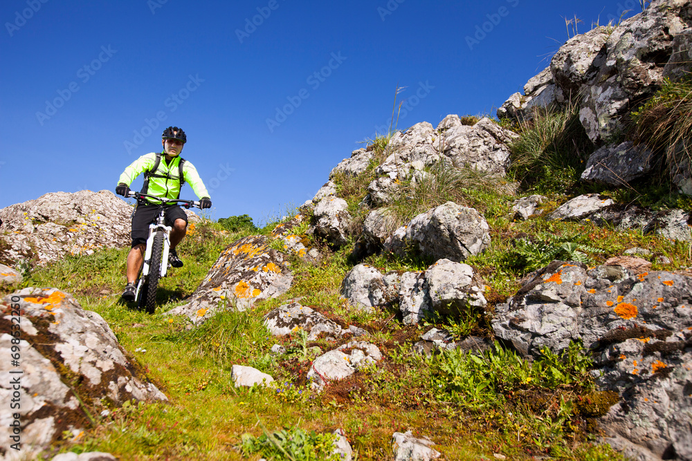 Mountain biker riding on his btt bike