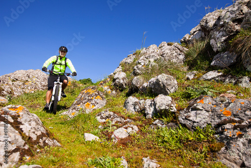 Mountain biker riding on his btt bike