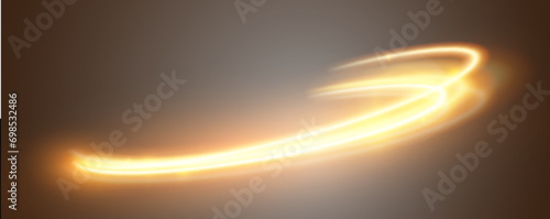 Light gold effect of shiny lines.Gold color glowing design element.Wavy bright stripes.
