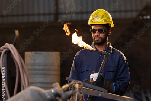 Photography Portrait of Male welder working at factory