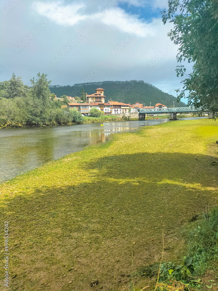 Fototapeta premium river passing through town