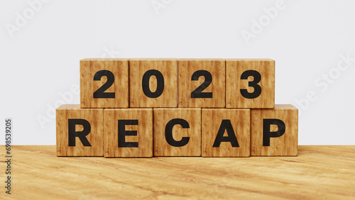 2023 Recap economy, business, financial summary, business review concept. Business plan for 2024. 2023 Recap on wooden cubes. 3d illustration