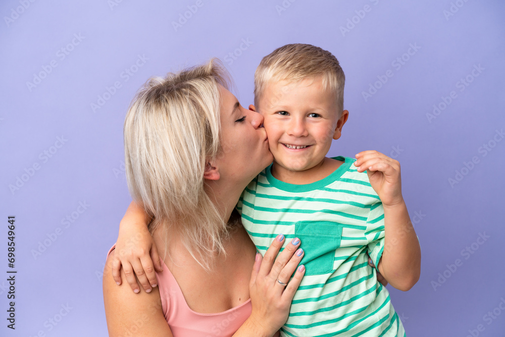 Mother and son over isolated background Mother and son over isolated background