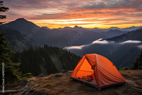 Dusk Adventure: Peachy-Orange Tent In A Scenic Landscape For Backpacking photo