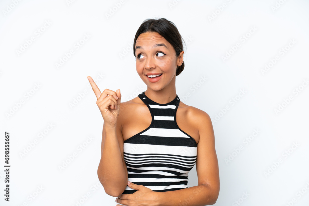 Young hispanic woman isolated on white background intending to realizes the solution while lifting a finger up Young hispanic woman isolated on white background intending to realizes the solution while lifting a finger up