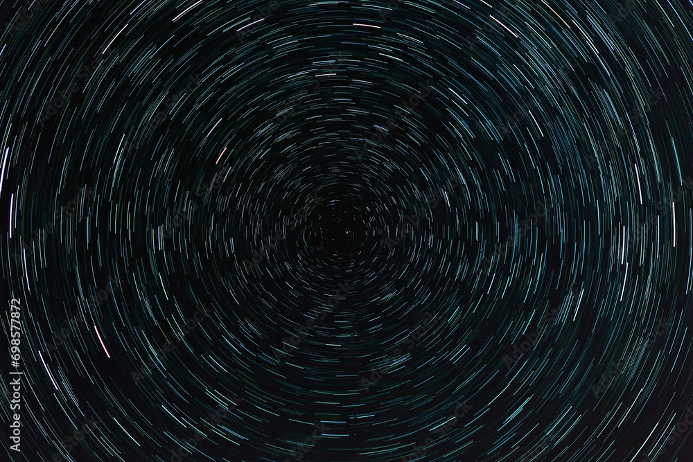 Traces of circular motion of the stars around the North Star. Traces of circular motion of the stars around the North Star.