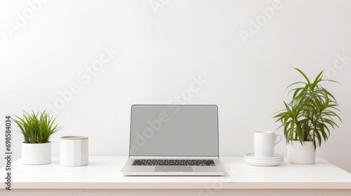 Work desk against a white wall background © ภวัต สายวงค์