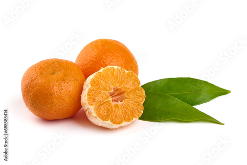 Ripe tangerines with leaves  isolated on a white background.