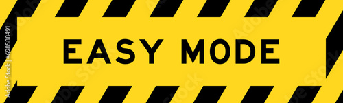 Yellow and black color with line striped label banner with word easy mode