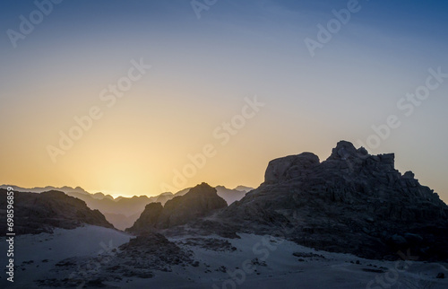peaks of mountains in the desert of egypt against sunset
