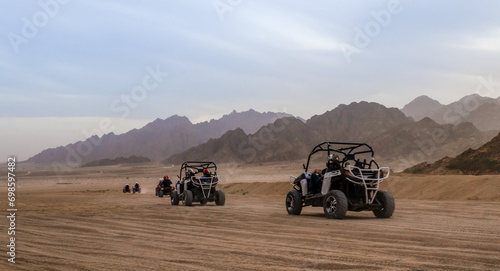 trip of tourists to the desert on the offroad buggy in Egypt