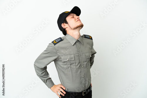 Young Russian security man isolated on white background suffering from backache for having made an effort