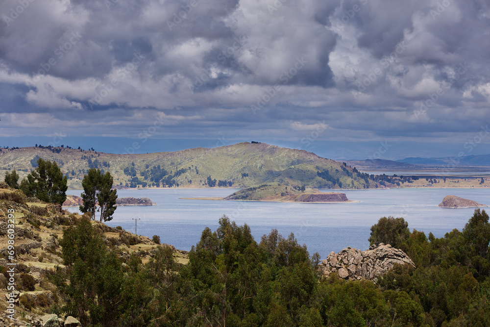 Lake Titicaca is a large, deep lake in the Andes on the border between Peru and Bolivia. It is considered one of the highest navigable lakes in the world.