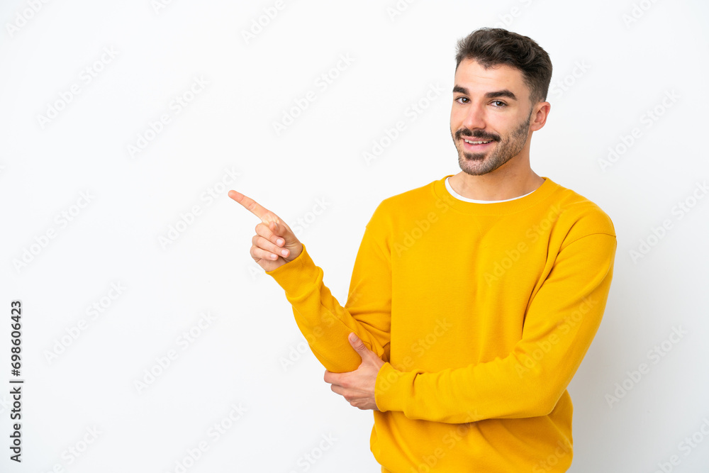 Young caucasian man isolated on white background pointing finger to the side Young caucasian man isolated on white background pointing finger to the side