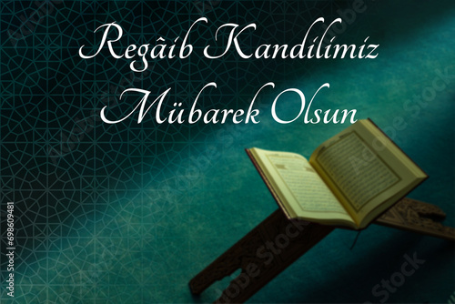 Regaip Kandili concept image. The Holy Quran on the book stand in a mosque photo