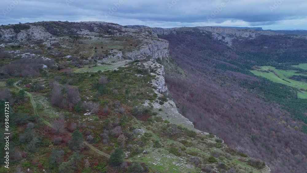 Winter landscape around the trap for hunting wolves (Canis lupus), called the Lobera de Barrón in the Sierra de Arcamo. Aerial view from a drone. Artaza. Alava. Basque Country. Spain. Europe Winter landscape around the trap for hunting wolves (Canis lupus), called the Lobera de Barrón in the Sierra de Arcamo. Aerial view from a drone. Artaza. Alava. Basque Country. Spain. Europe