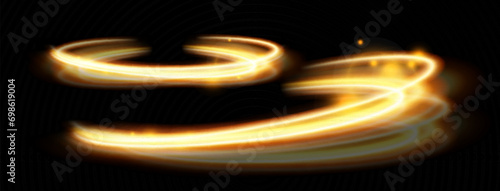 Light gold effect of shiny lines.Gold color glowing design element.Wavy bright stripes.
