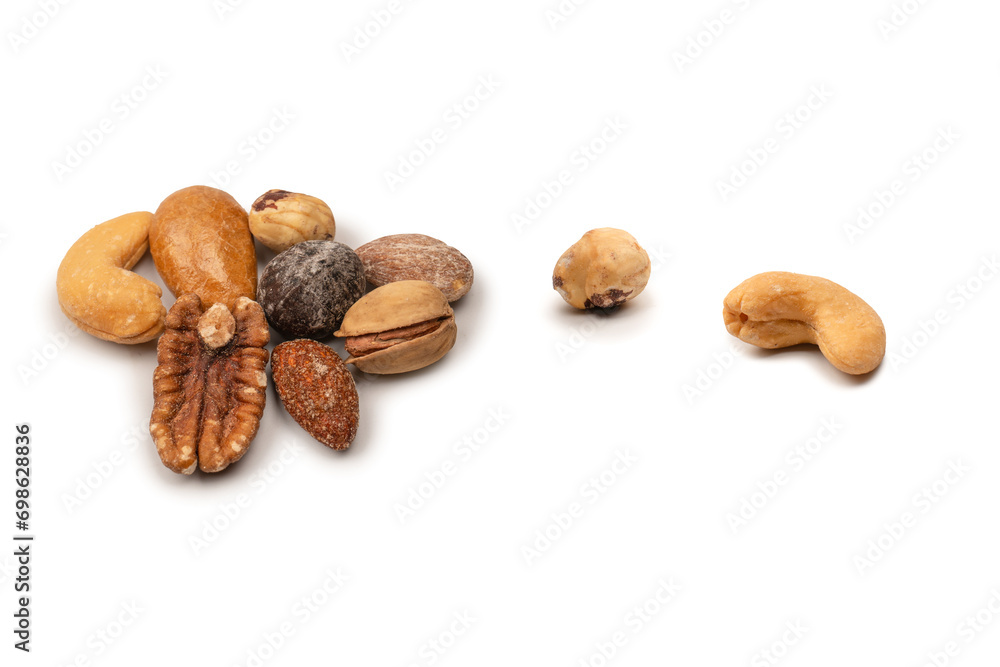 A group of almonds, pistachios, walnuts, macadamia, cashews. A group of almonds, pistachios, walnuts, macadamia, cashews.