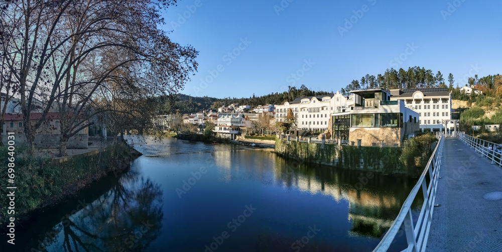 Panoramic view of the thermal area of S. Pedro do Sul, Vouga River and buildings on the banks of the river supporting thermal spas, hotels and others, Viseu, Portugal Panoramic view of the thermal area of S. Pedro do Sul, Vouga River and buildings on the banks of the river supporting thermal spas, hotels and others, Viseu, Portugal