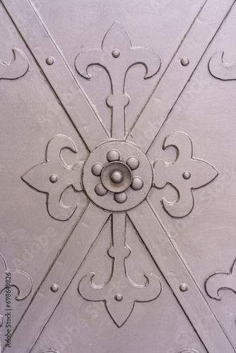 lily motif on wrought iron front door