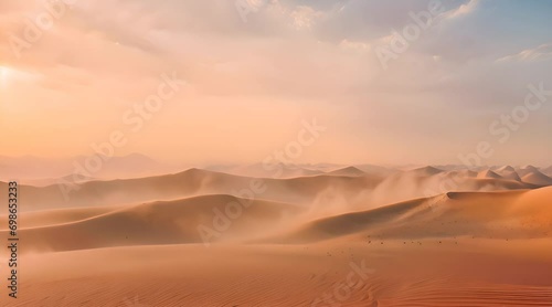 Sand blowing in the wind in the desert dunes photo