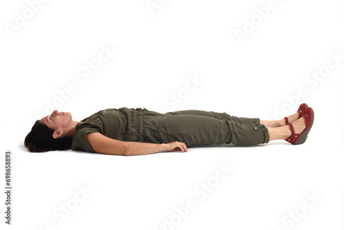 woman lying on the floor looking up on white background photo