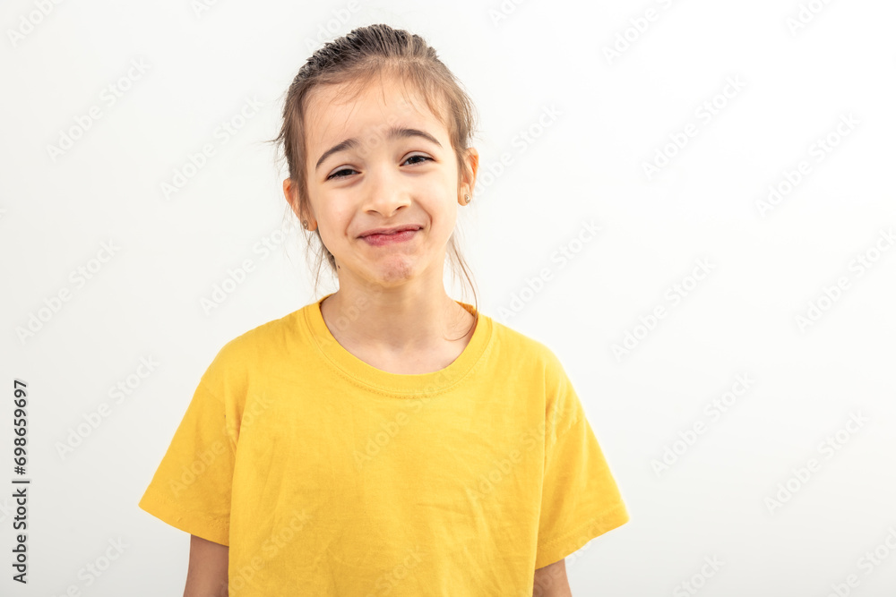 Happy little Caucasian girl smiling on white background isolated. Happy little Caucasian girl smiling on white background isolated.
