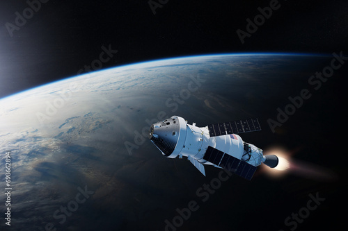 Wallpaper Mural Spaceship Orion on low-orbit of Earth. Artemis space program. Elements of this image furnished by NASA. Torontodigital.ca