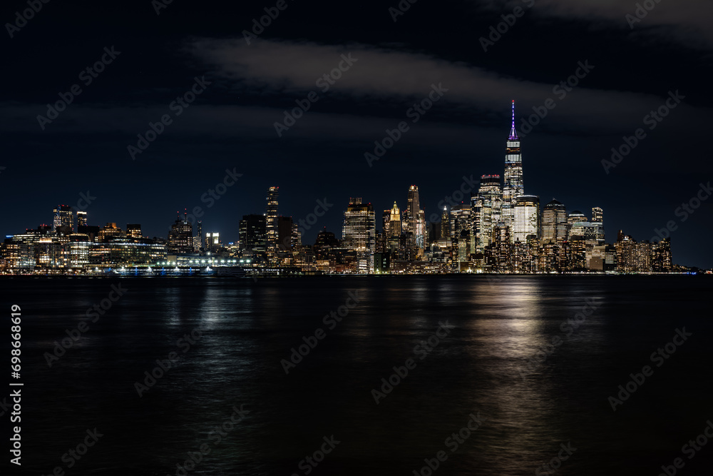 Night image of Lower Manhattan skyline, New York City, from Hoboken, NJ.