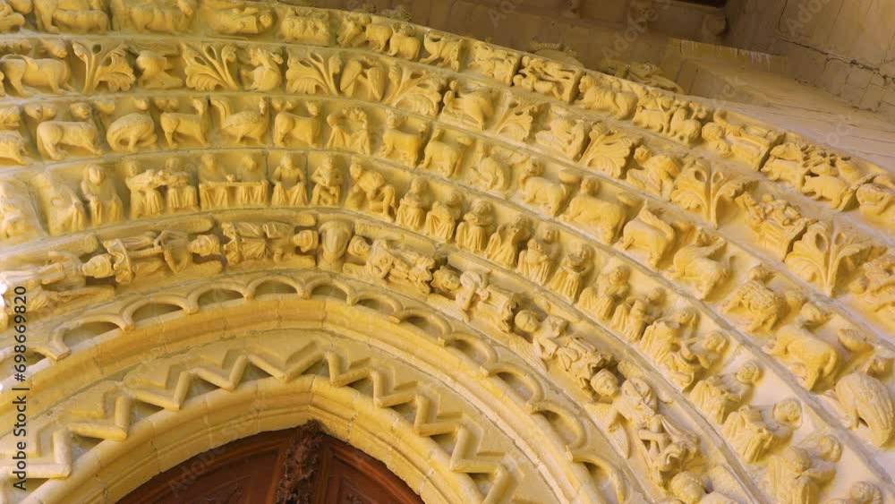 Romanesque portico in the church of Our Lady of the Assumption in the town of Tuesta. Valdegovia Valley. Alava. Basque Country. Spain. Europe Romanesque portico in the church of Our Lady of the Assumption in the town of Tuesta. Valdegovia Valley. Alava. Basque Country. Spain. Europe