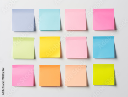 Colorful sheets for sticky notes on white background photo