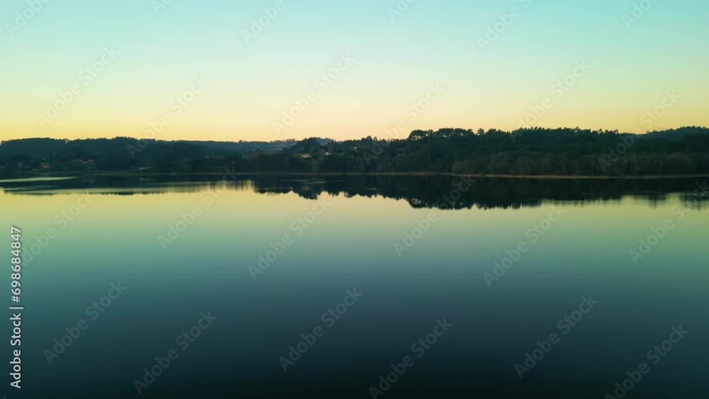 Peaceful View Of Encoro de Cecebre Reservoir During Sunset In Cambre, A Coruña, Spain. Aerial Pullback Shot Peaceful View Of Encoro de Cecebre Reservoir During Sunset In Cambre, A Coruña, Spain. Aerial Pullback Shot