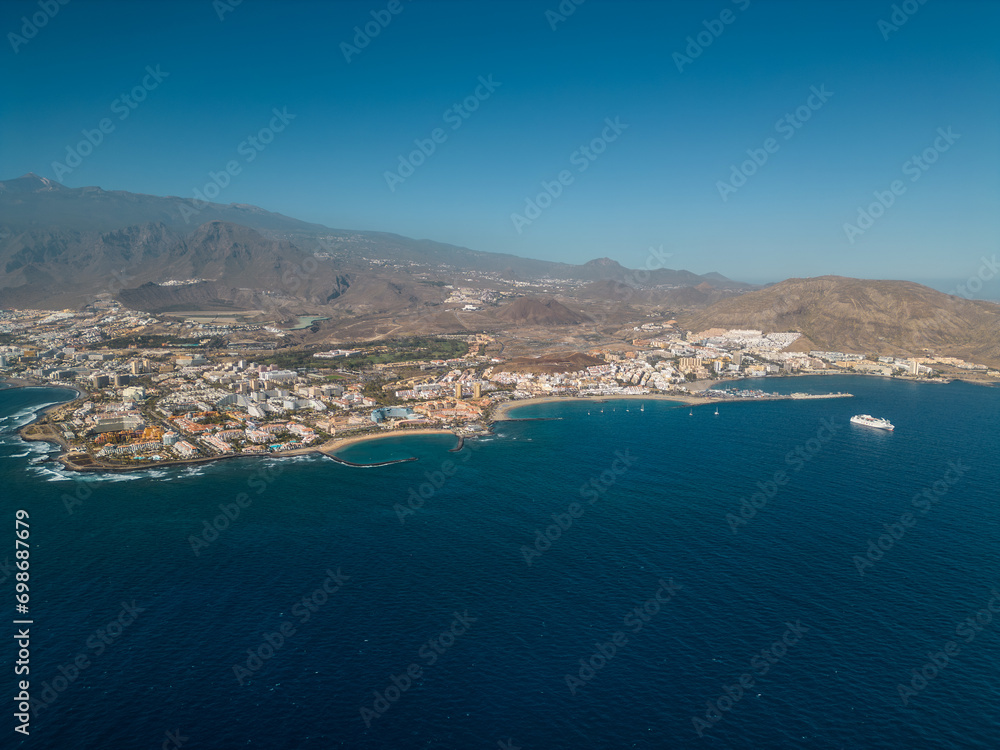 ocean shore with hotels and beach, Los Cristianos, Tenerife, Canary, aerial shot