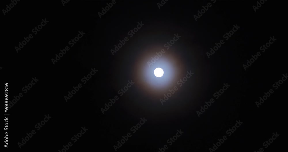 lunar halo - a circular rainbow forming around the moon, real time shot speed lunar halo - a circular rainbow forming around the moon, real time shot speed