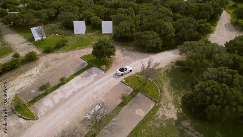 White convertible on the background of figwams photo