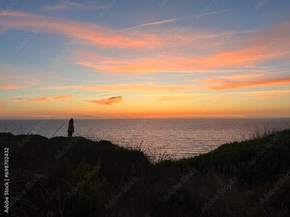 Ocean and purple sky at the ocean bay, orange ocean horizon