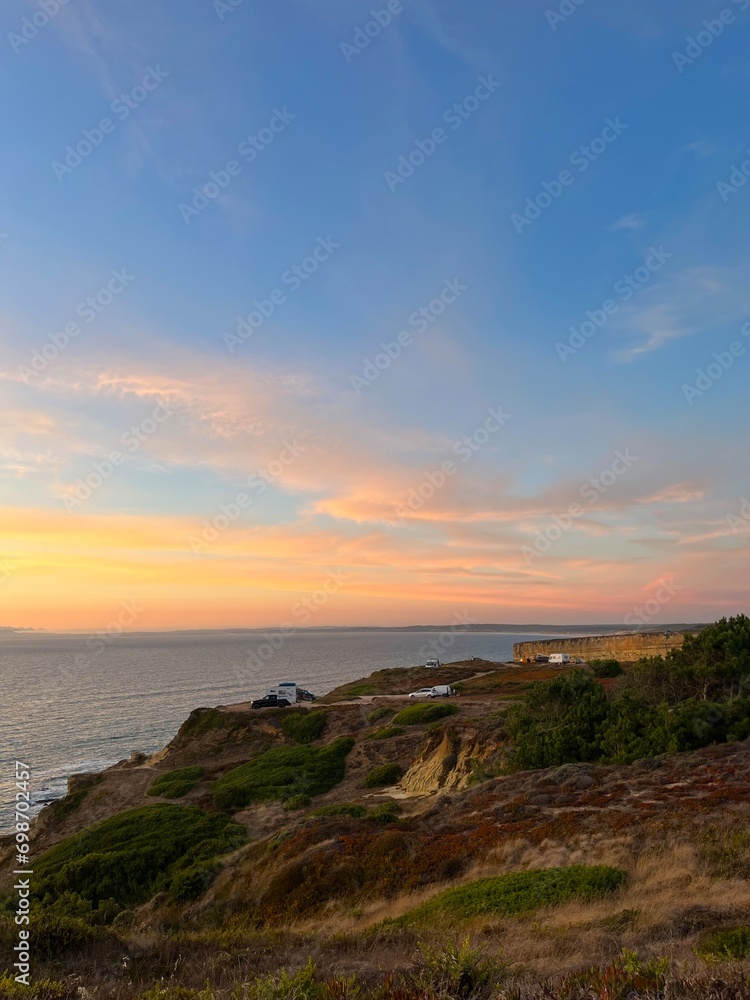 Ocean and purple sky at the ocean bay, orange ocean horizon Ocean and purple sky at the ocean bay, orange ocean horizon