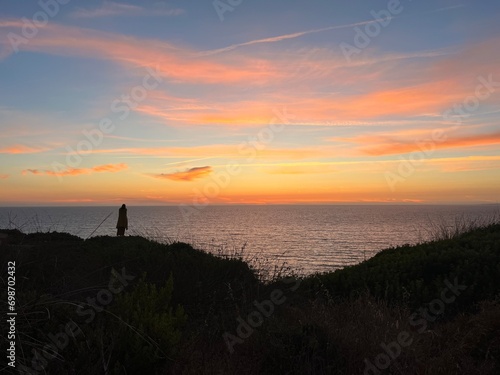 Ocean and purple sky at the ocean bay, orange ocean horizon