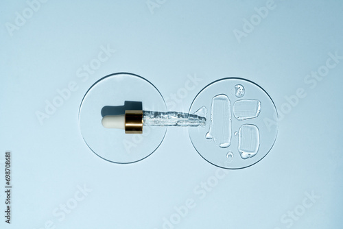 Serum Dropper and Spilled Liquid representing high-end skincare products