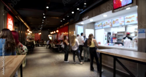 Time Lapse video of People Ordering from the Fast Food restaurant. Blurred background 4K video