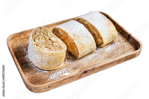 Traditional homemade apple strudel on a wooden tray. Transparent background. Isolated.