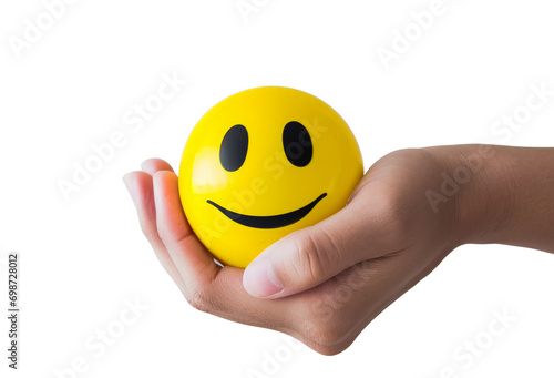 Hand holding a smiley face stress ball, isolated on transparent background, png, - concept for happiness, positivity, and mental health.
