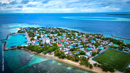 Drone Aerial View of Mahibadhoo an island town in central Maldives 