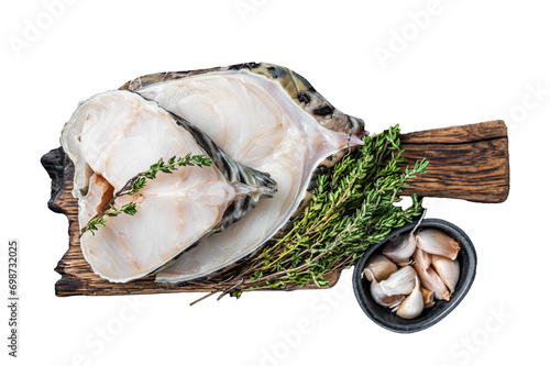 Fresh Raw wolffish o wolf fish Steak on a butcher board.  Transparent background. Isolated. photo