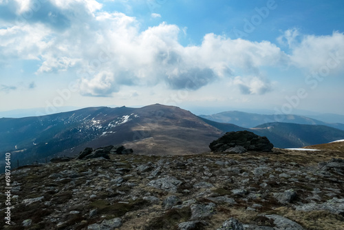 Panoramic view of Lavanttal Alps seen from Amerinkogel on Packalpe at border Carinthia and Styria  Austria. Remote alpine hill landscape in Austrian Alps. Wanderlust. Tranquil scene on meadows