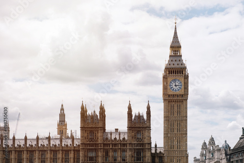 Buildings of Parliament with Big Ben tower in London photo