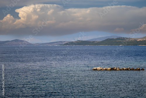 Ionian sea surrounded by mountains, Corfu, Greece