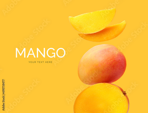 Creative layout made of mango  on the yellow background. Flat lay. Food concept. Macro concept. 